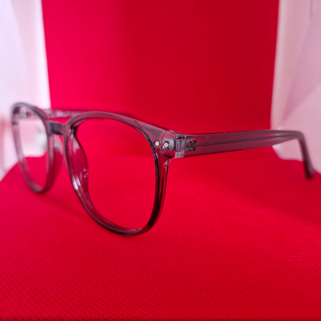 Armazón de Acetato gris transparente marca ALTERNA + Cristales Ópticos CR39 con capa AR, protección 100% UV.