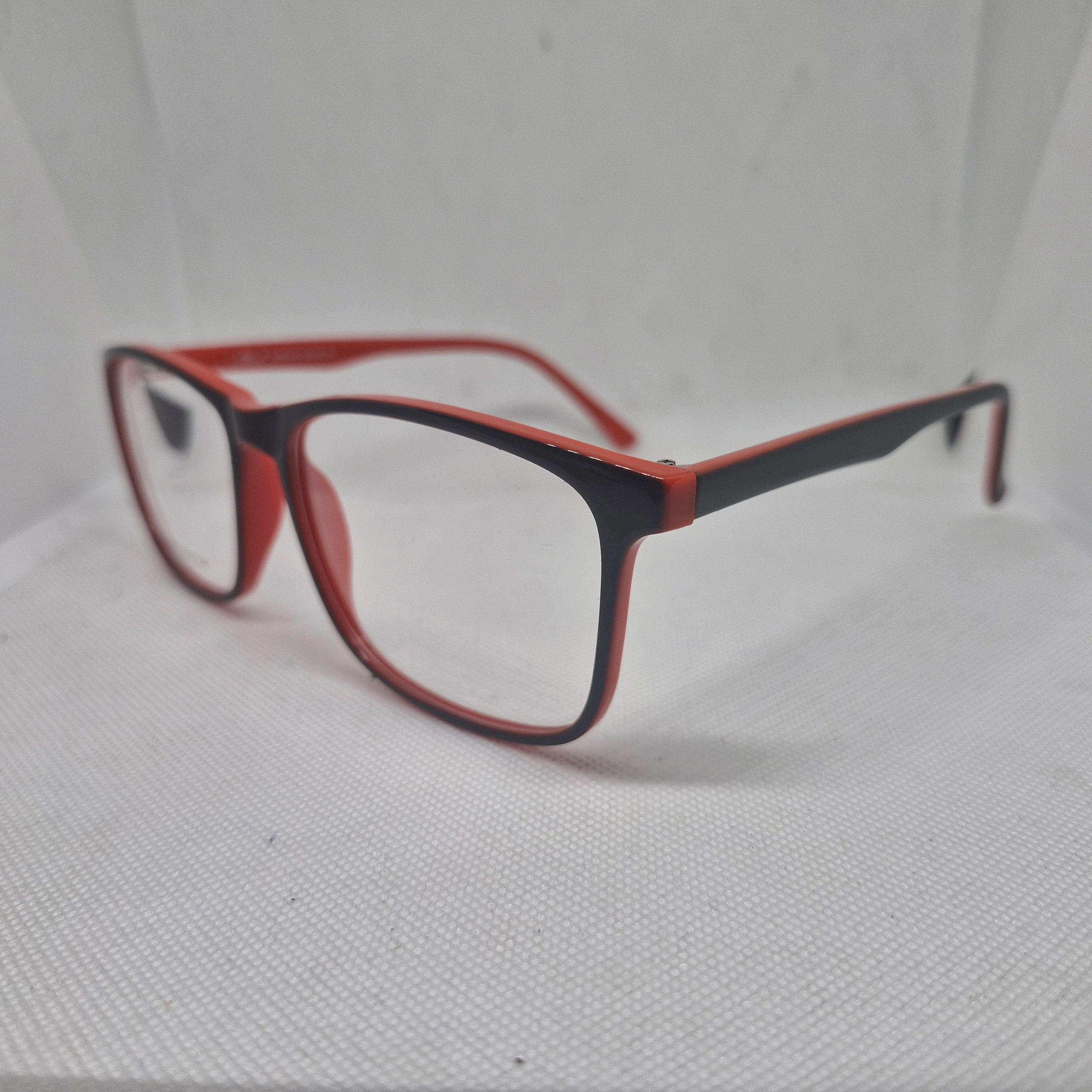 Armazón de ACETATO marca ALTERNA color NEGRO y ROJO + Cristales Ópticos CR39 con capa AR, protección 100% UV.