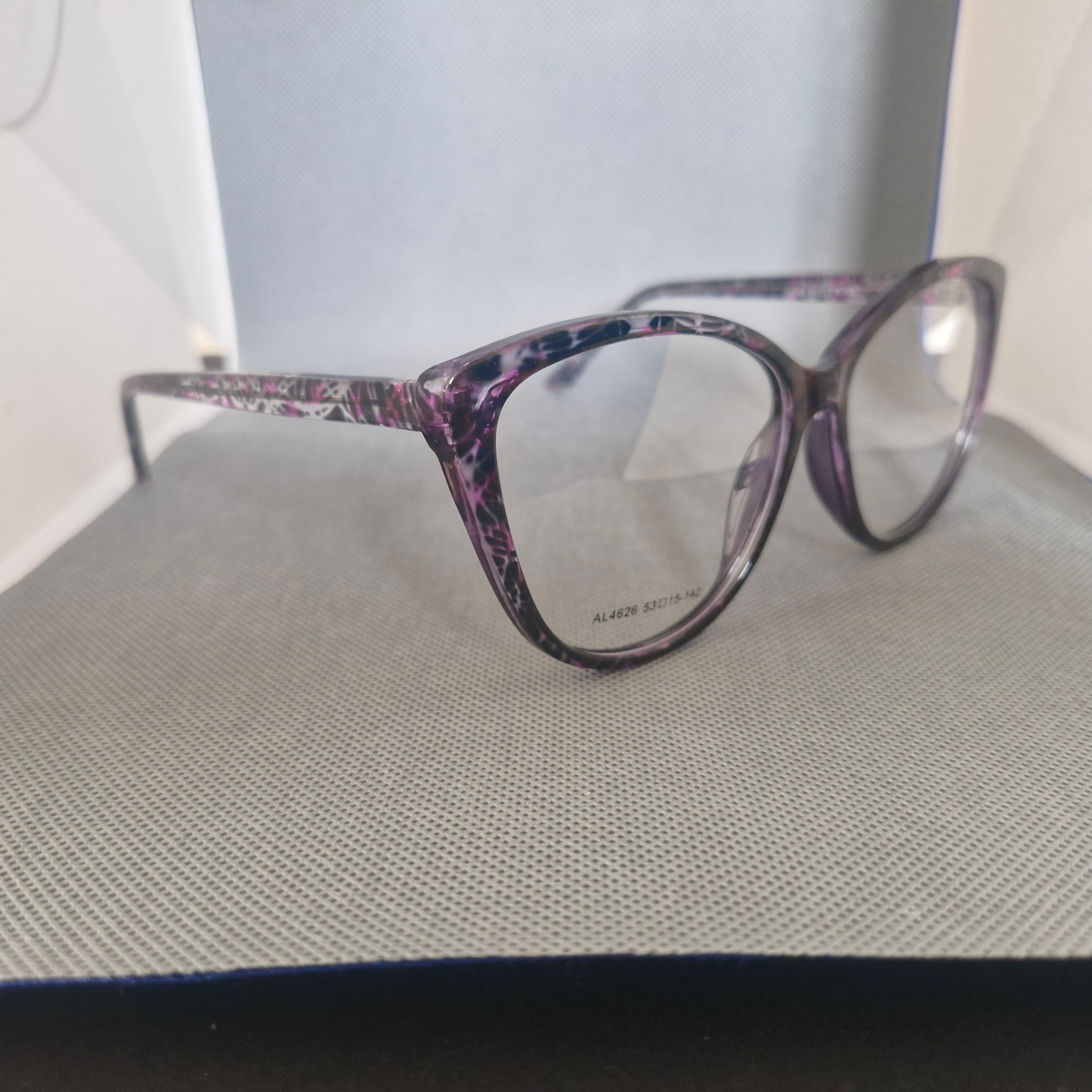 Marco Óptico de ACETATO marca ALTERNA color purpura aspeado + Cristales Ópticos CR39 con capa AR y protección 100% UV.