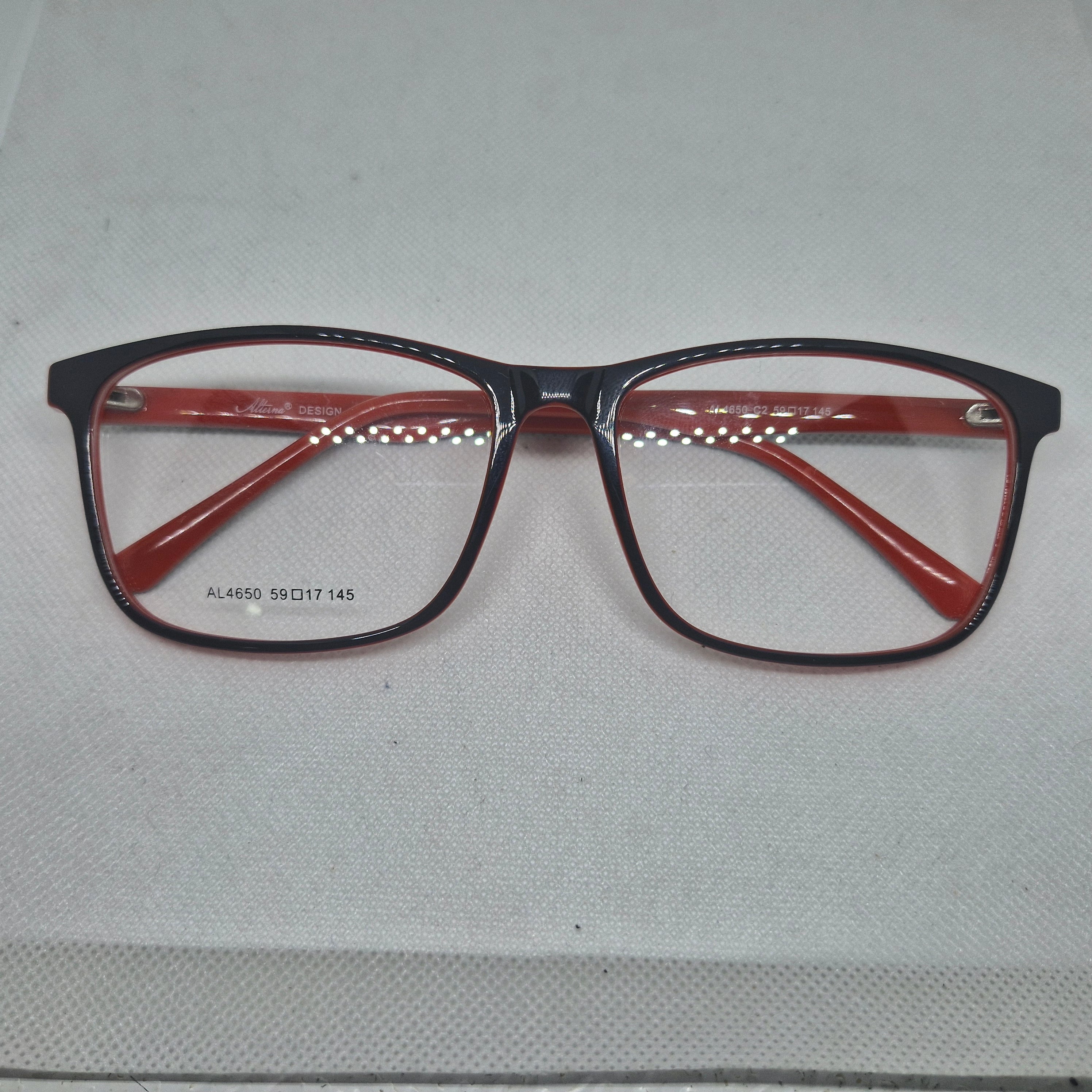 Armazón de ACETATO marca ALTERNA color NEGRO y ROJO + Cristales Ópticos CR39 con capa AR, protección 100% UV.