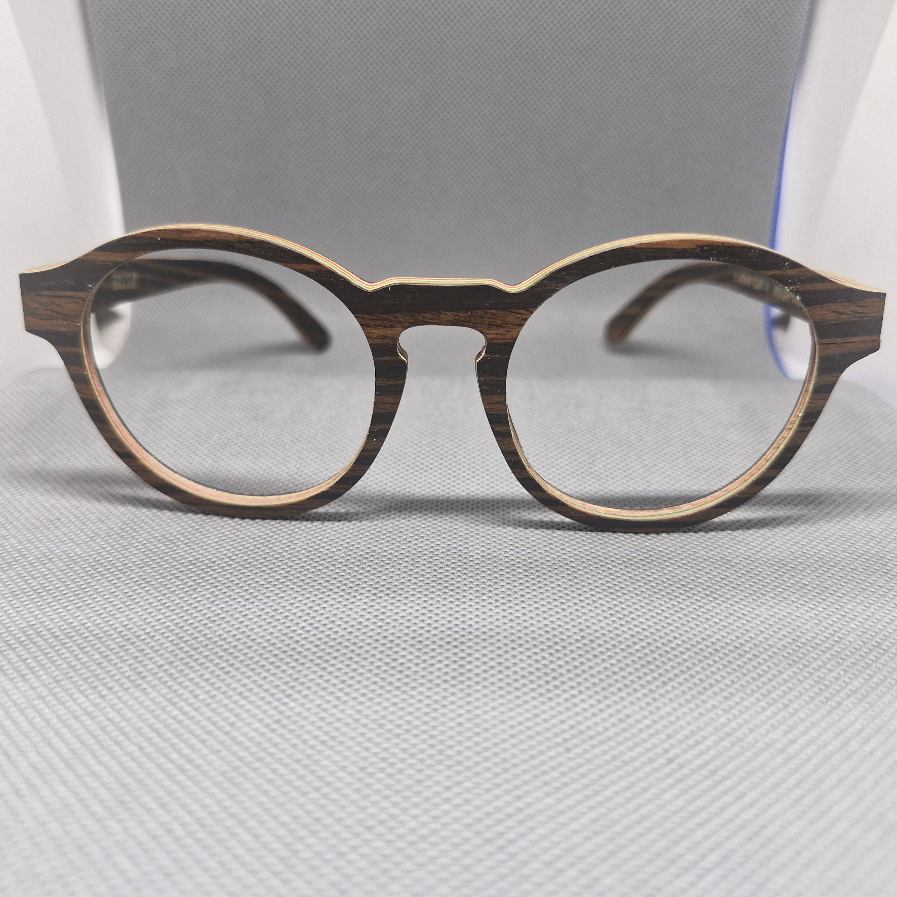 Armazón de MADERA marca BIGSUR en colores BLUE NAVY y BROWN SMOKE + Cristales Ópticos con capa AR, protección 100% UV.
