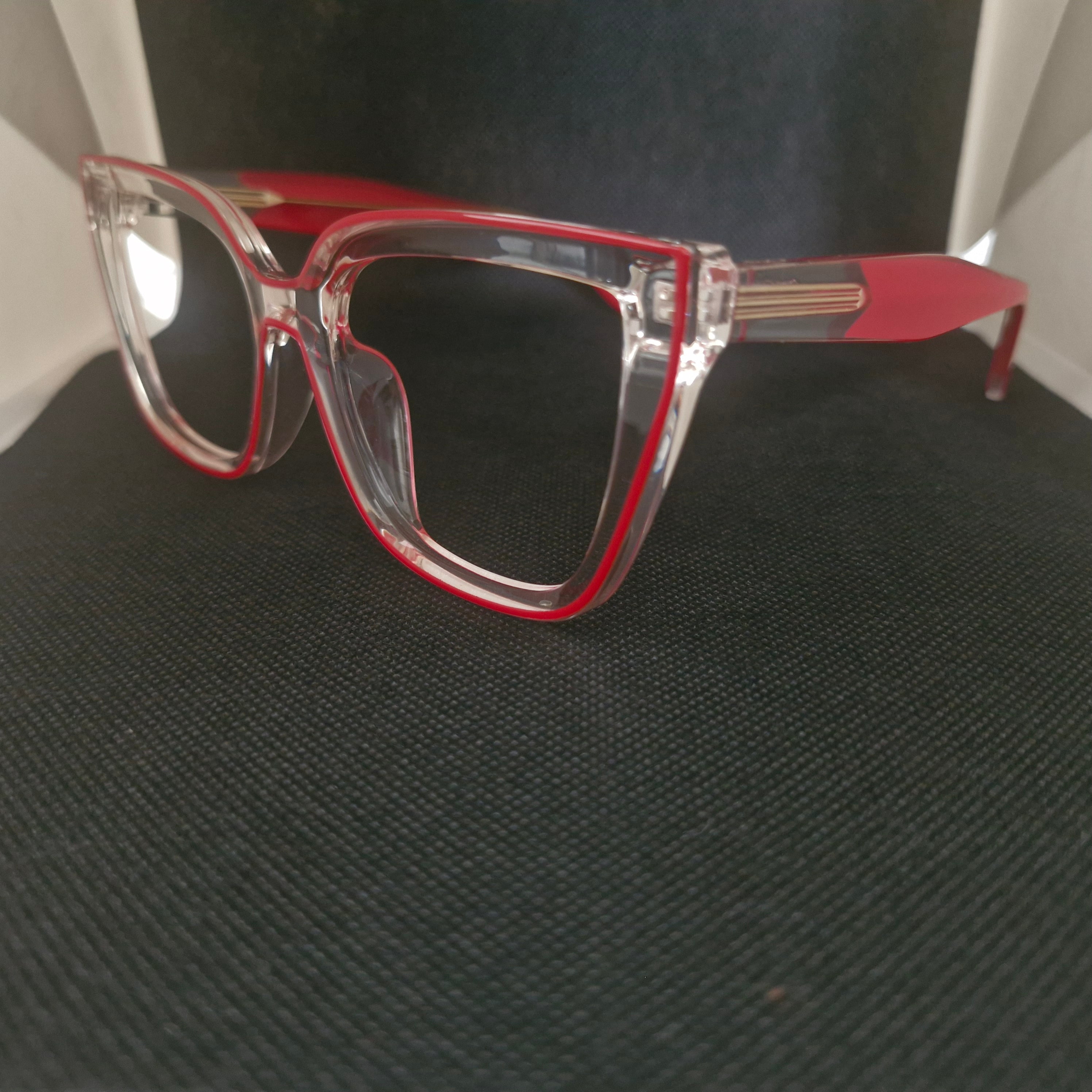 Armazón de ACETATO (TR90) marca UV400 color Transparente + Cristales Ópticos CR39 con AR, protección 100% UV.