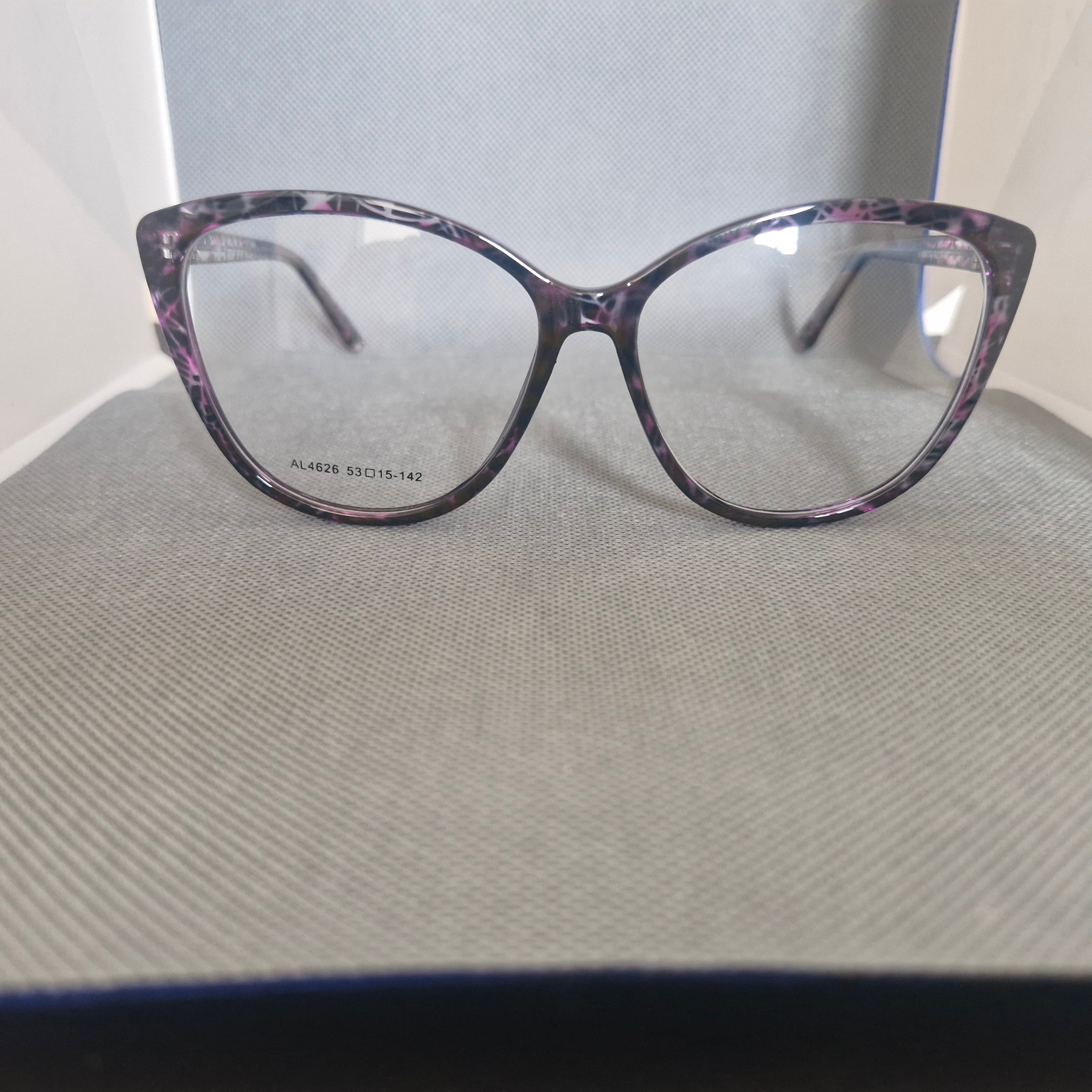 Marco Óptico de ACETATO marca ALTERNA color purpura aspeado + Cristales Ópticos CR39 con capa AR y protección 100% UV.