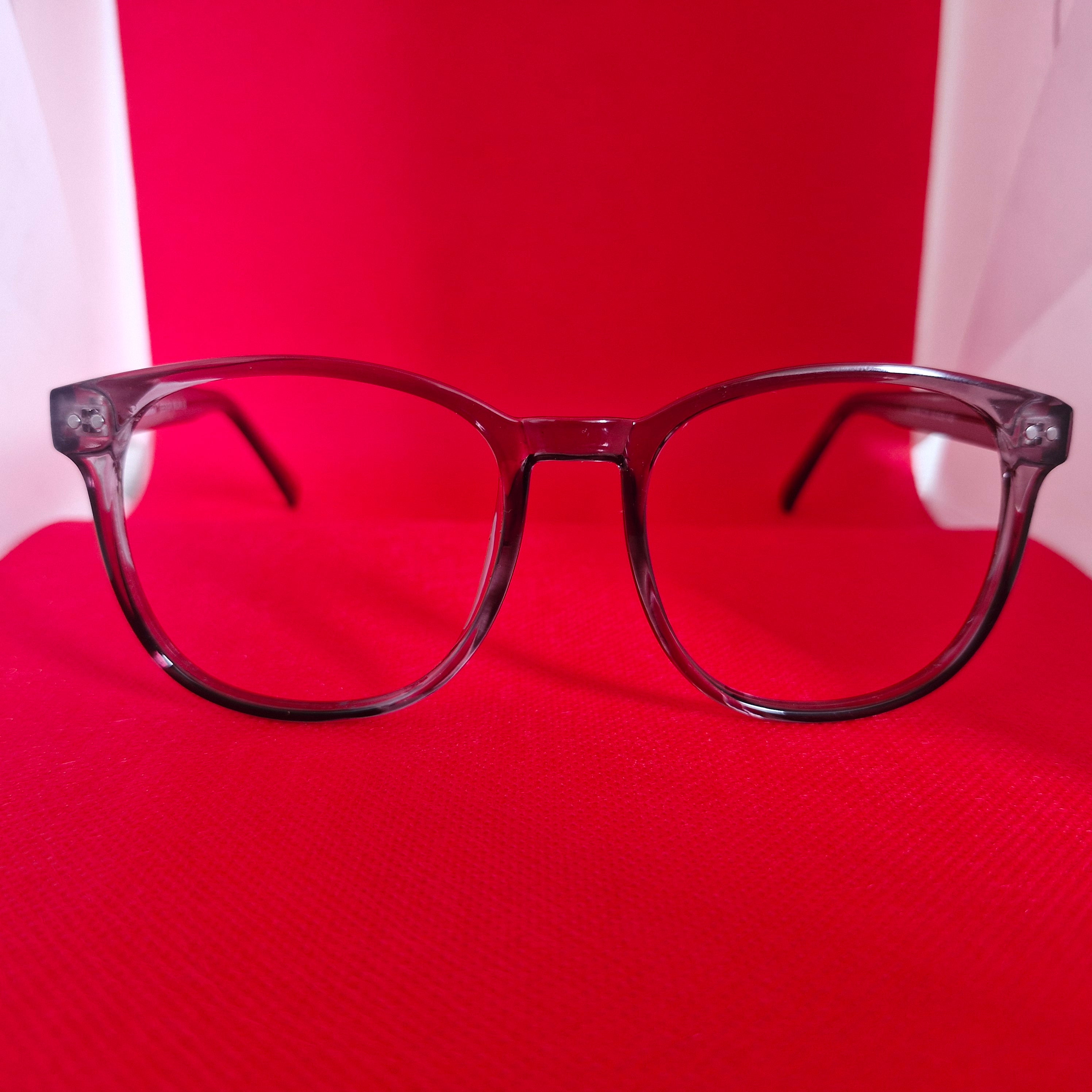 Armazón de Acetato gris transparente marca ALTERNA + Cristales Ópticos CR39 con capa AR, protección 100% UV.