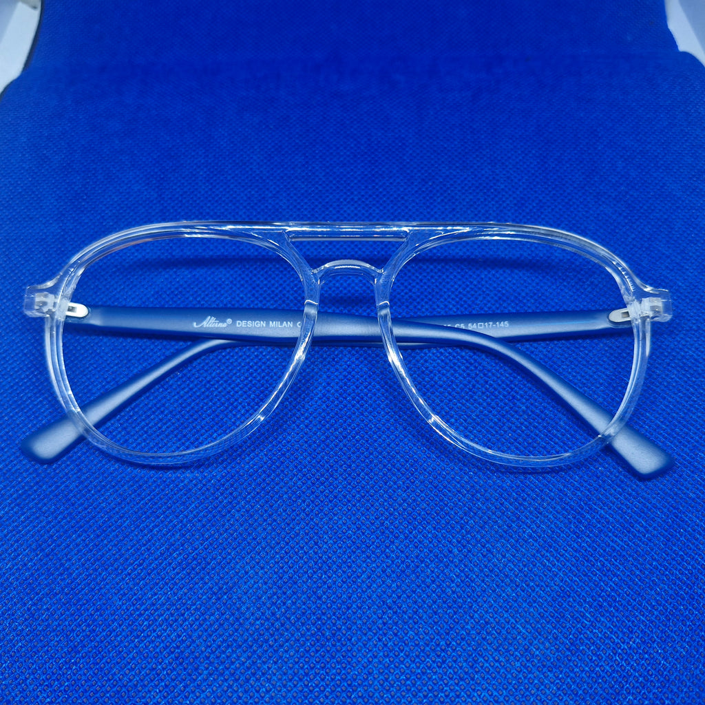 Armazón de ACETATO marca ALTERNA (transparente y varillas azules) + Cristales Ópticos CR39 con capa AR, protección 100% UV.