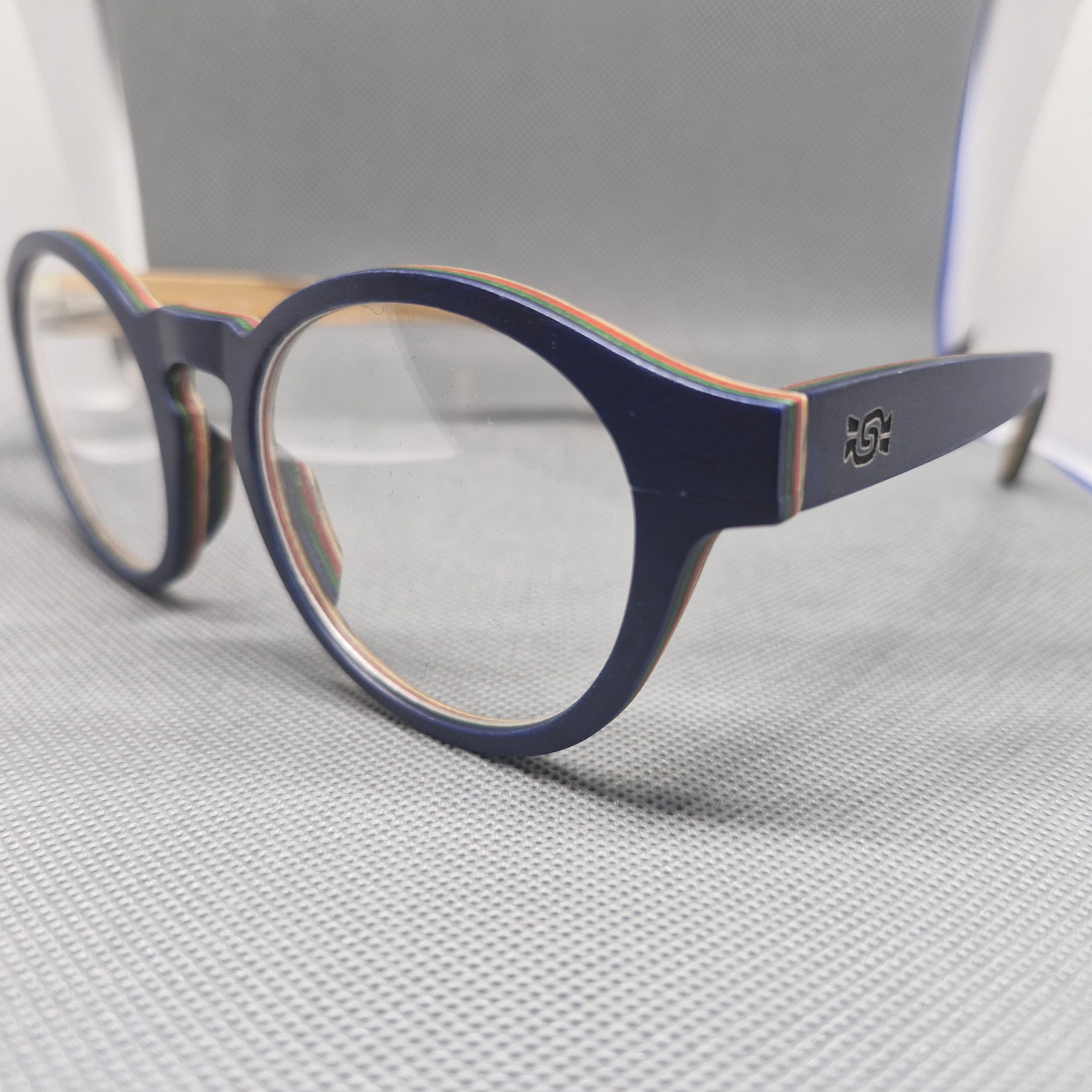 Armazón de MADERA marca BIGSUR en colores BLUE NAVY y BROWN SMOKE + Cristales Ópticos con capa AR, protección 100% UV.