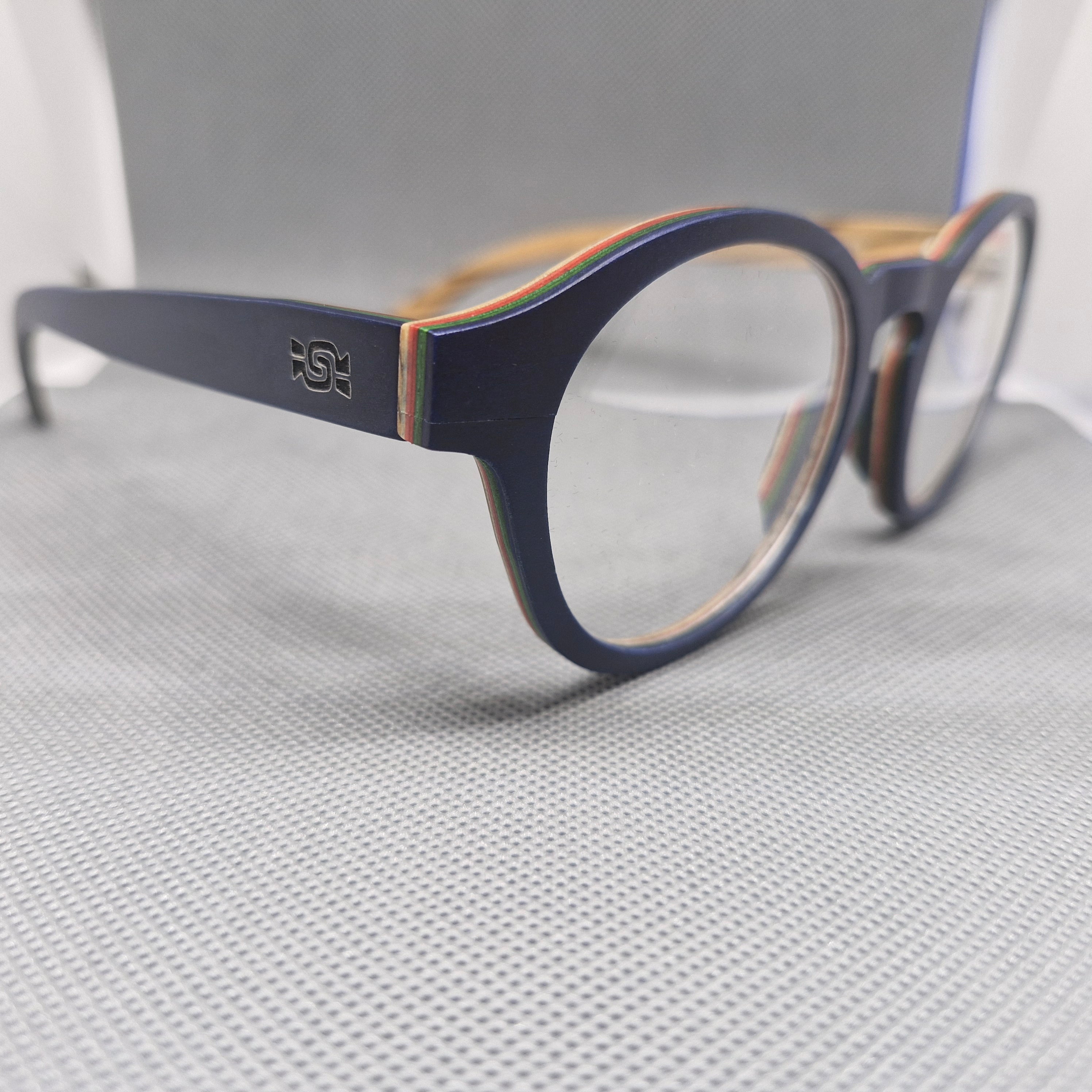 Armazón de MADERA marca BIGSUR en colores BLUE NAVY y BROWN SMOKE + Cristales Ópticos con capa AR, protección 100% UV.