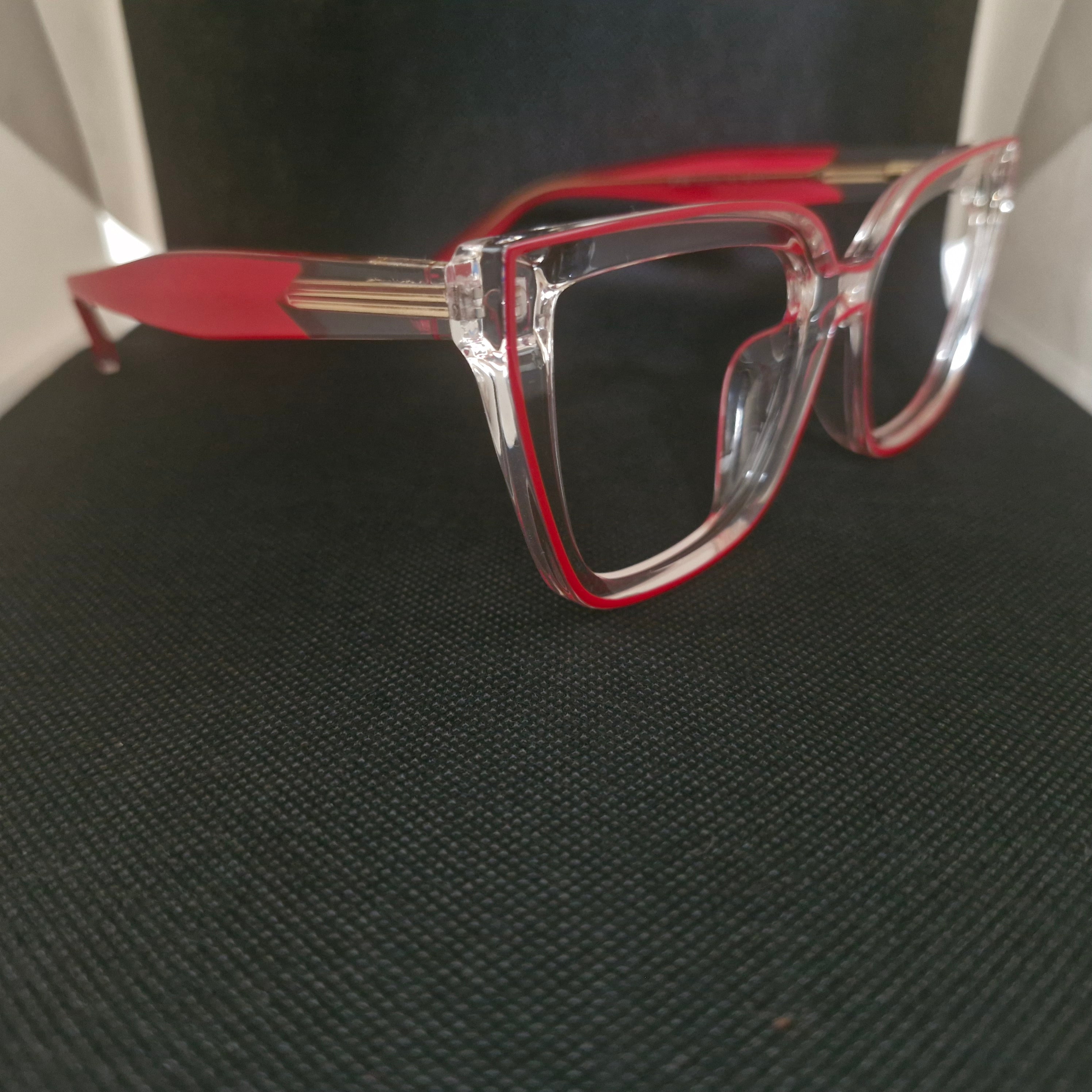 Armazón de ACETATO (TR90) marca UV400 color Transparente + Cristales Ópticos CR39 con AR, protección 100% UV.