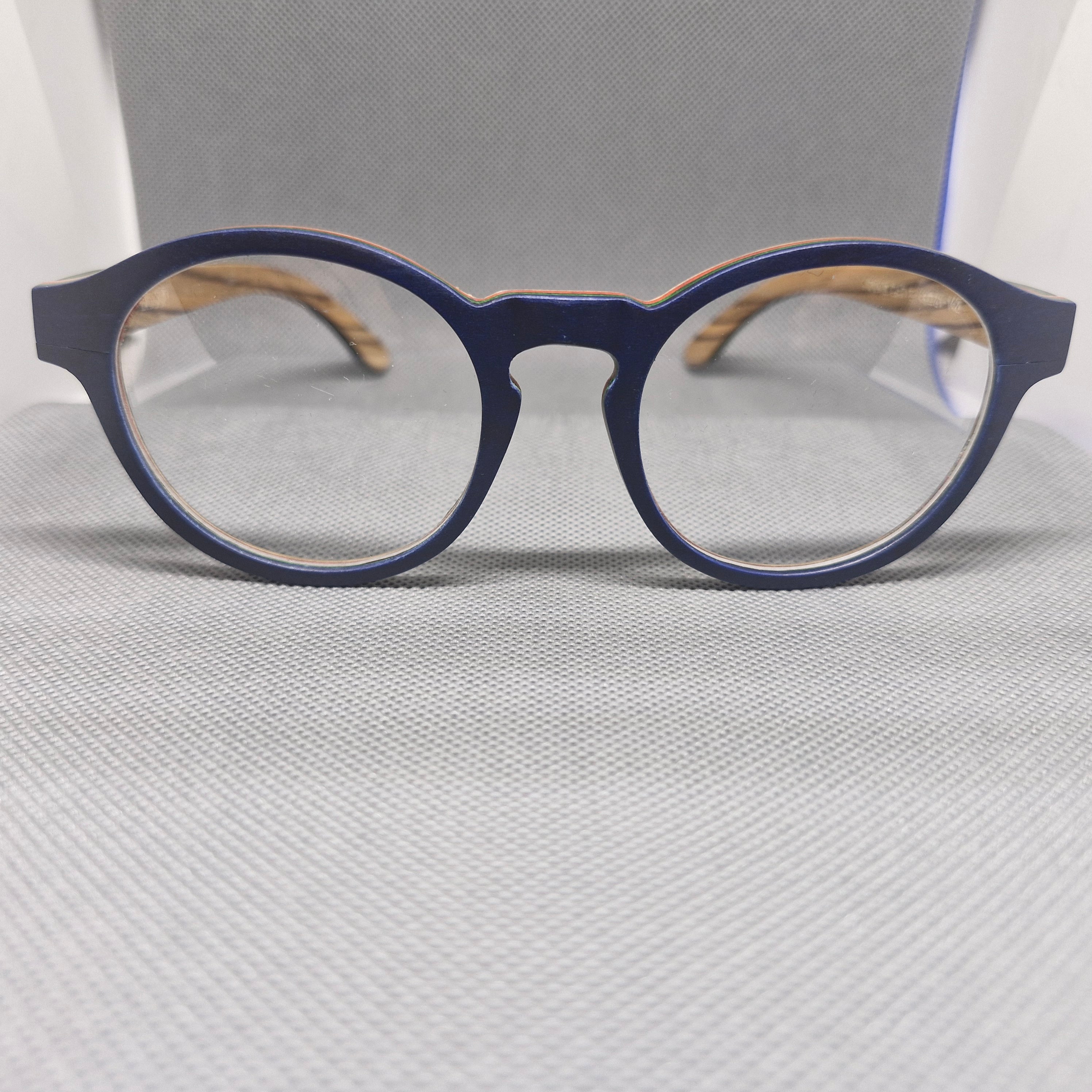 Armazón de MADERA marca BIGSUR en colores BLUE NAVY y BROWN SMOKE + Cristales Ópticos con capa AR, protección 100% UV.