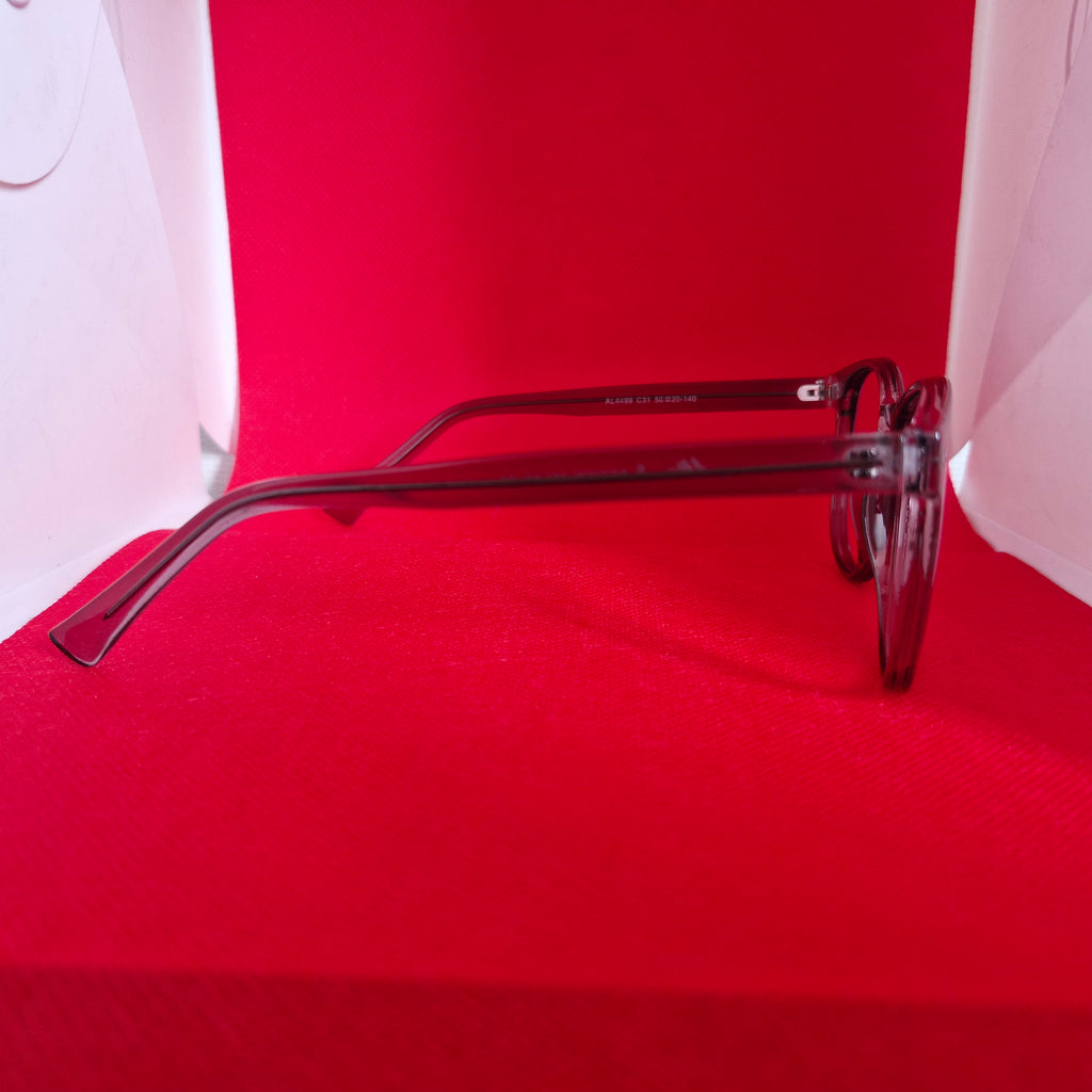 Armazón de Acetato gris transparente marca ALTERNA + Cristales Ópticos CR39 con capa AR, protección 100% UV.